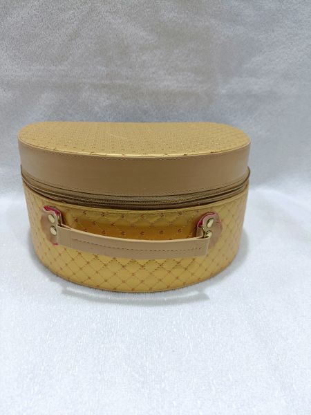 golden color glittery small vanity Box